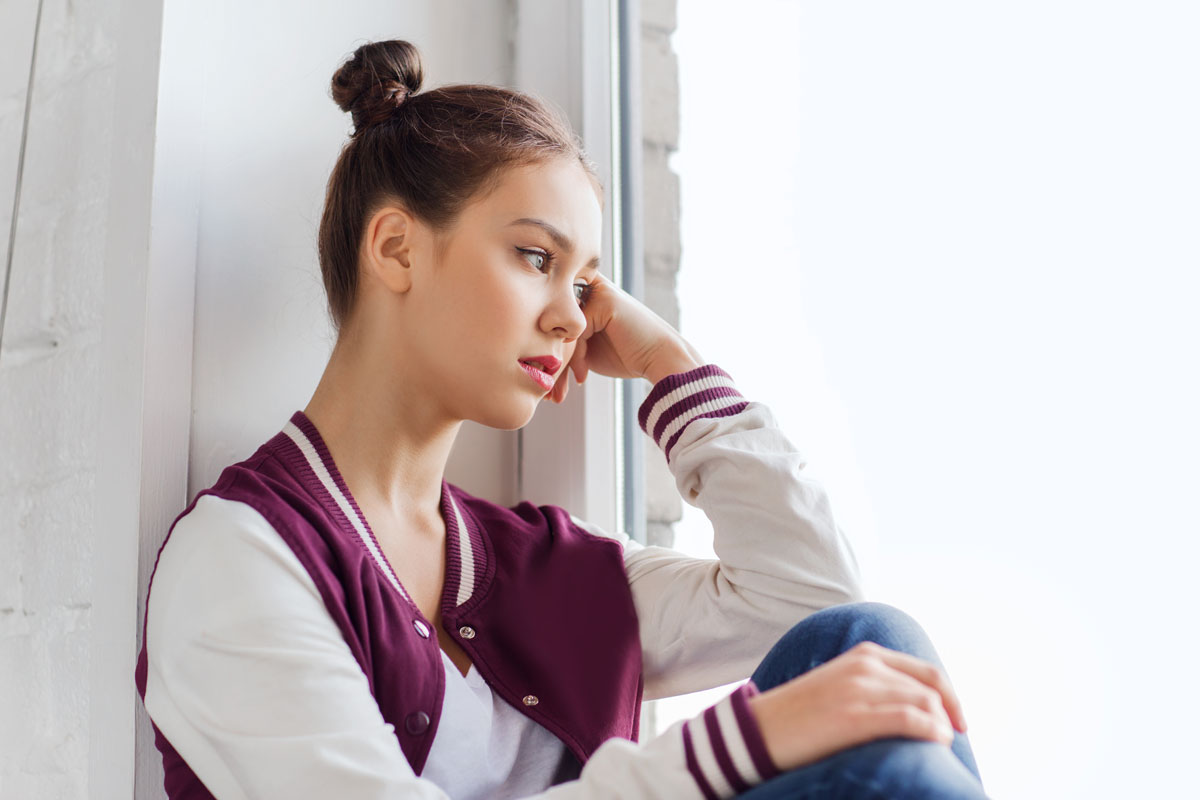 Stock image of a young person looking worried